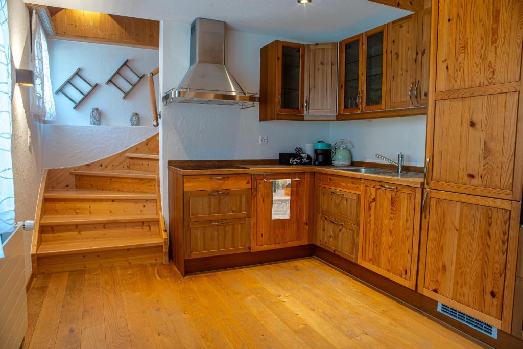 Kuchyň nebo kuchyňský kout v ubytování Chalet Santa Maria