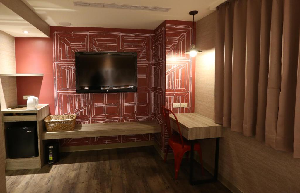 TV a/nebo společenská místnost v ubytování Central Hotel