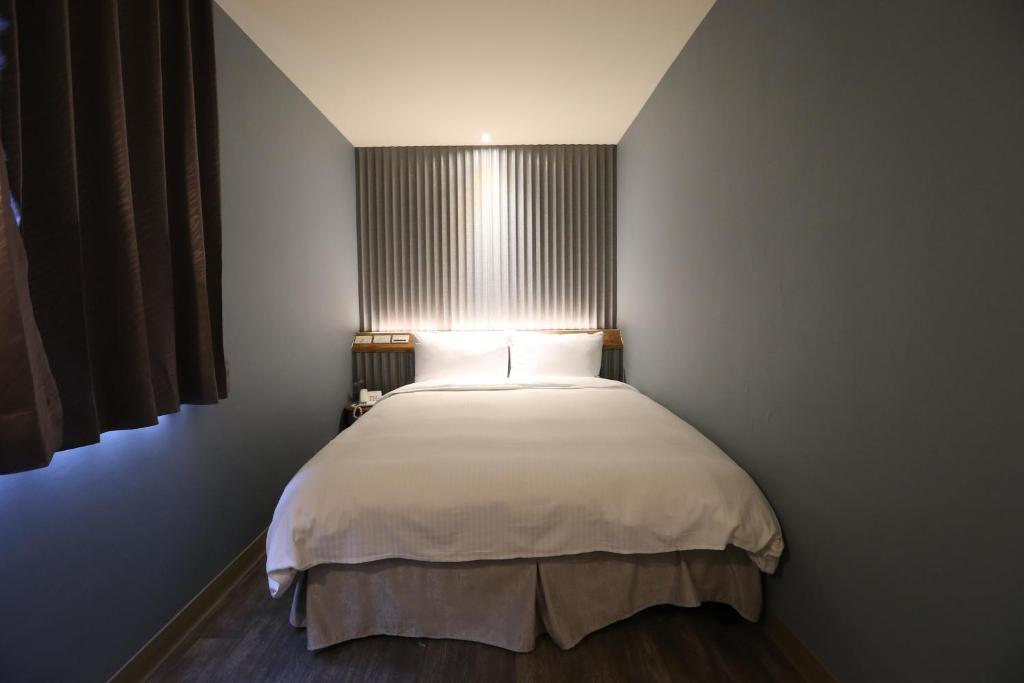Postel nebo postele na pokoji v ubytování Central Hotel