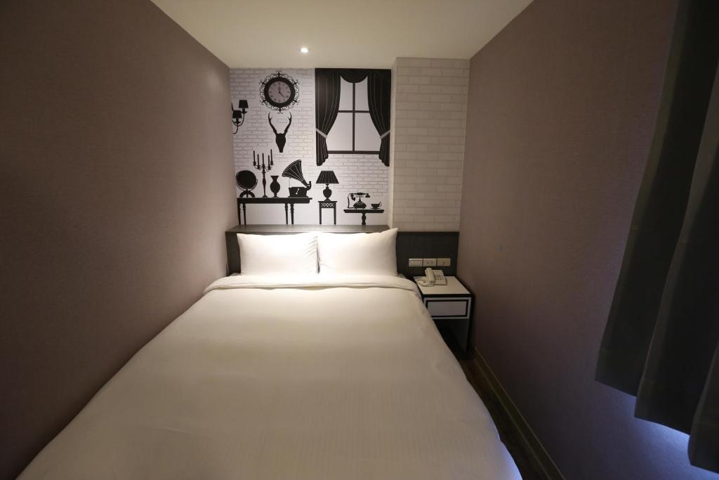 Postel nebo postele na pokoji v ubytování Central Hotel
