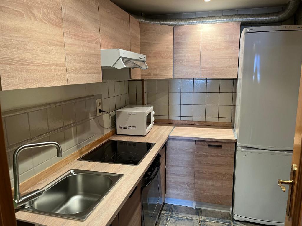 Kuchyň nebo kuchyňský kout v ubytování Hotel Ço De Pierra
