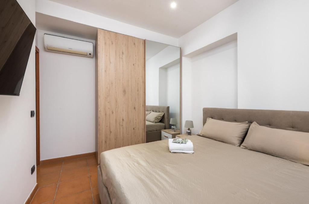 Postel nebo postele na pokoji v ubytování Tranquillity Suite Apartment