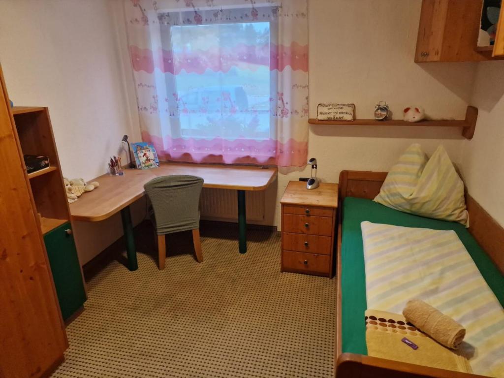 Postel nebo postele na pokoji v ubytování Haus Anicka zum Bömerwaldjeti