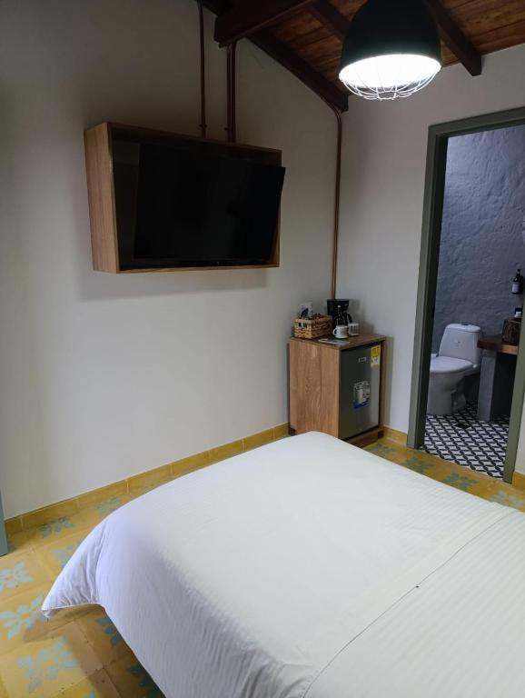 Letto o letti in una camera di HOTEl NUSS