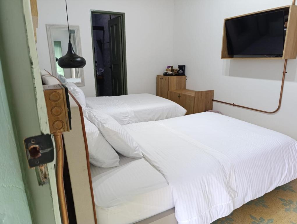 Letto o letti in una camera di HOTEl NUSS