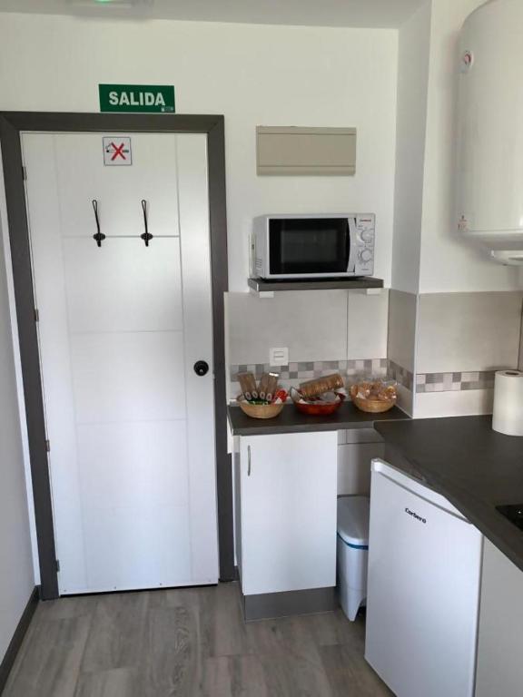 A kitchen or kitchenette at Mirador de Miranda Apartamentos Rural & Spa Inc
