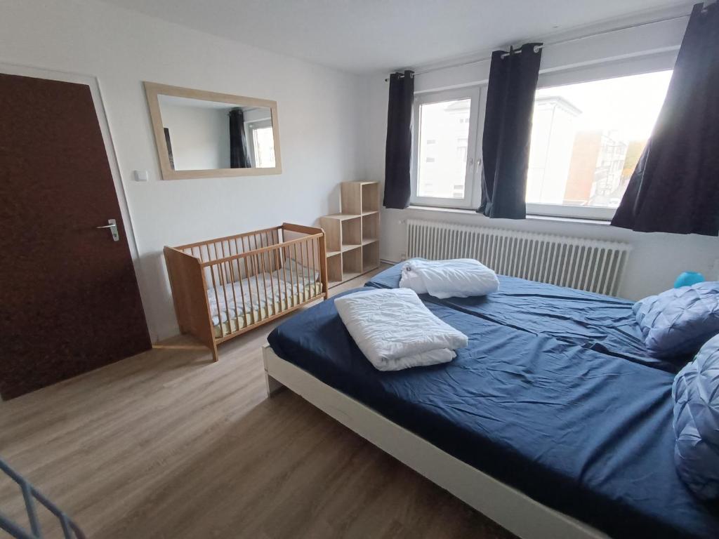 Postel nebo postele na pokoji v ubytování Ferienwohnung Nordsee mit E-Bike Verleih