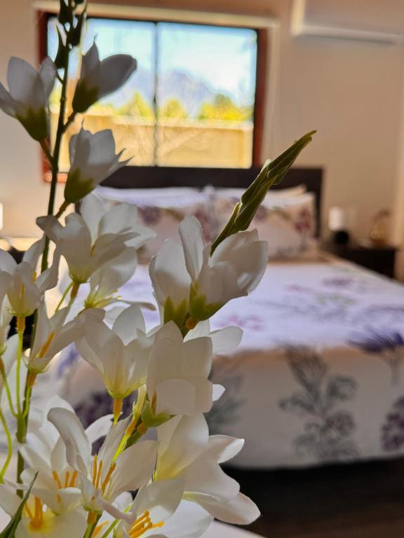 Postel nebo postele na pokoji v ubytování Hostal Treile