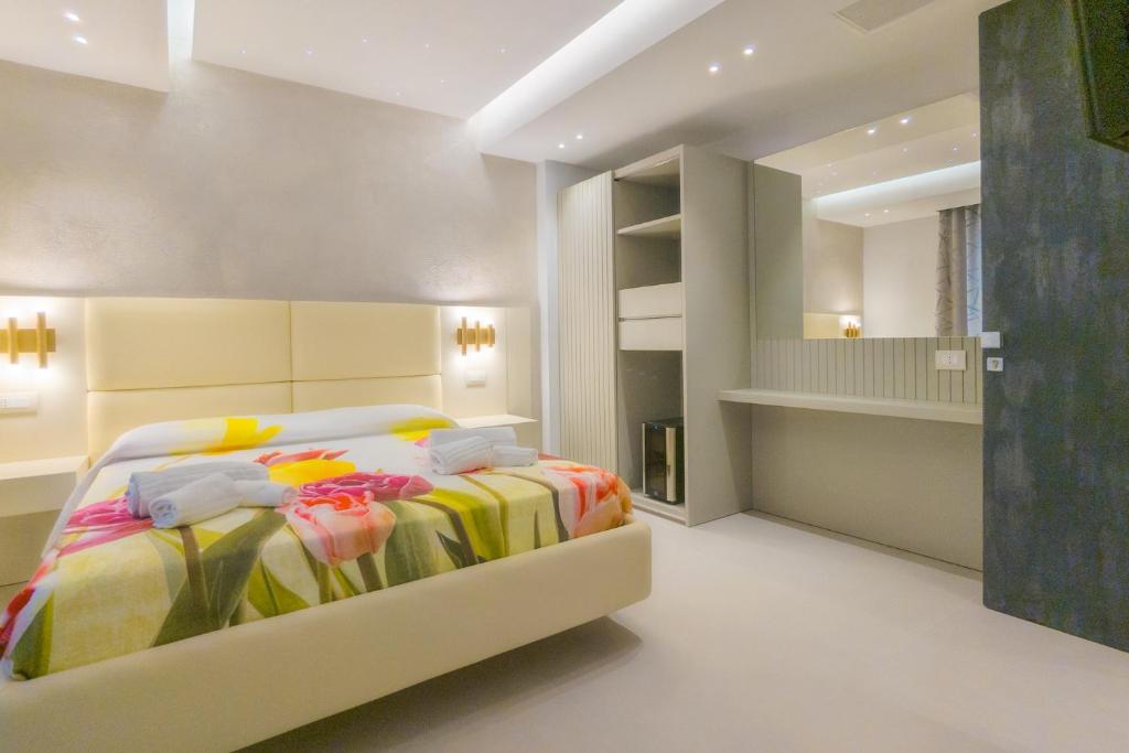 Postel nebo postele na pokoji v ubytování Residence AleDen