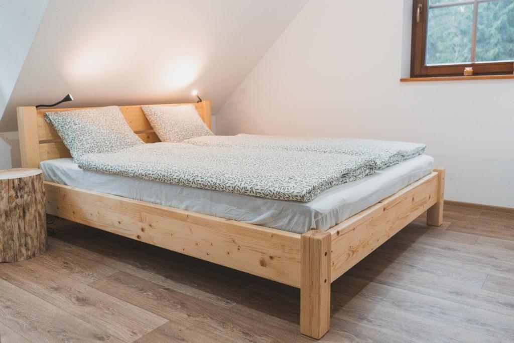 Postel nebo postele na pokoji v ubytování Wellness Chalupa Krajanka