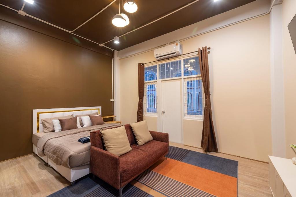 Postel nebo postele na pokoji v ubytování Queen On Street Guest House