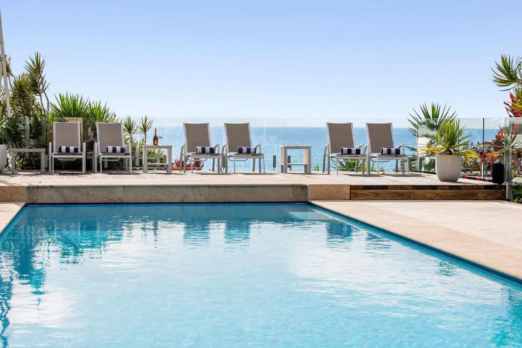 Piscina de la sau aproape de Solitary Views - Sapphire Beach