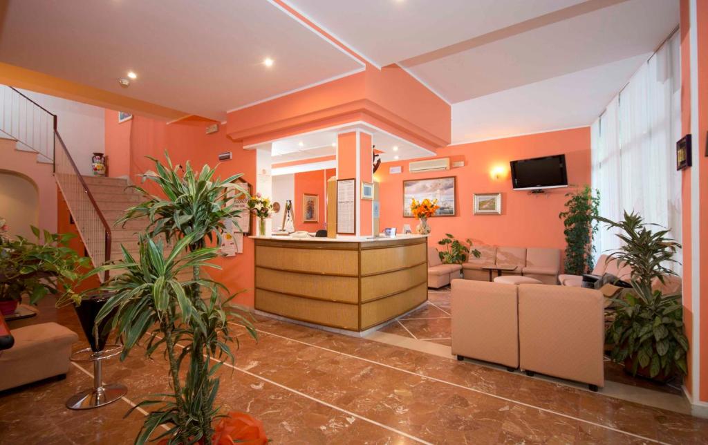 TV a/nebo společenská místnost v ubytování Hotel Veliero
