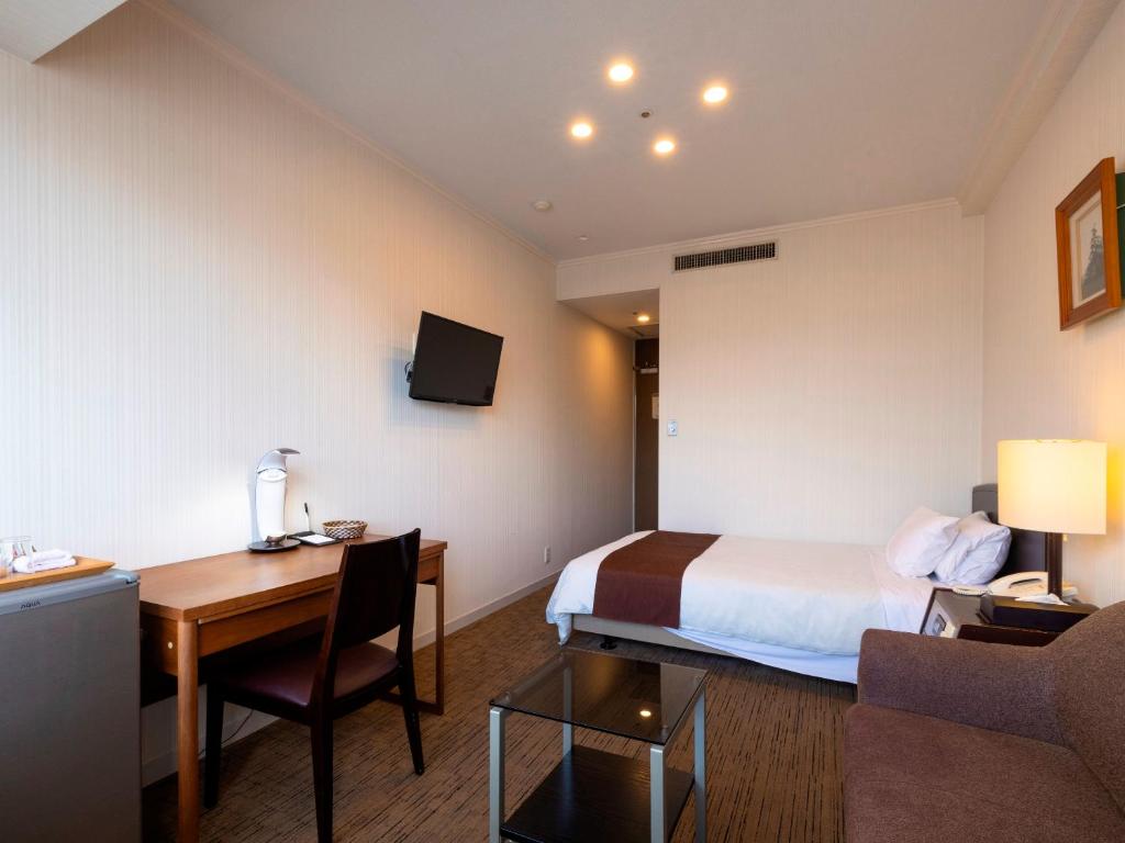 TV a/nebo společenská místnost v ubytování Hotel Sunvalley Fujimi