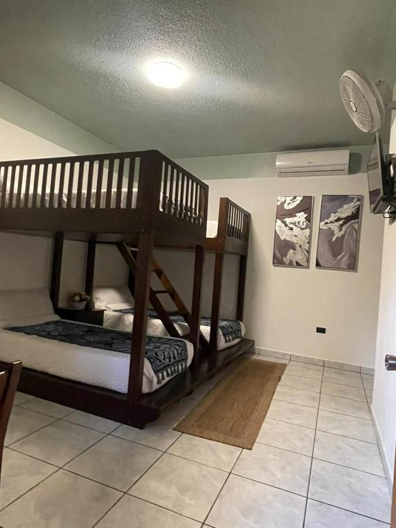 Postel nebo postele na pokoji v ubytování Hotel Itzae