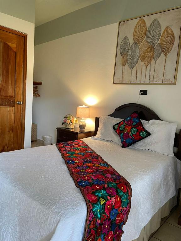 Postel nebo postele na pokoji v ubytování Hotel Itzae