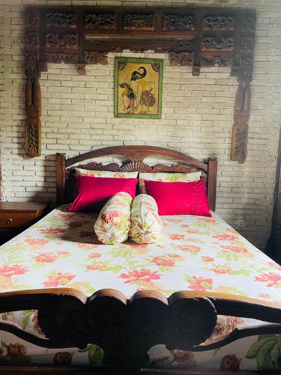 Postel nebo postele na pokoji v ubytování Merapi Eco Bungalow