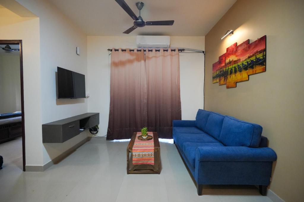 TV a/nebo společenská místnost v ubytování 1 BHK Near Varca Beach