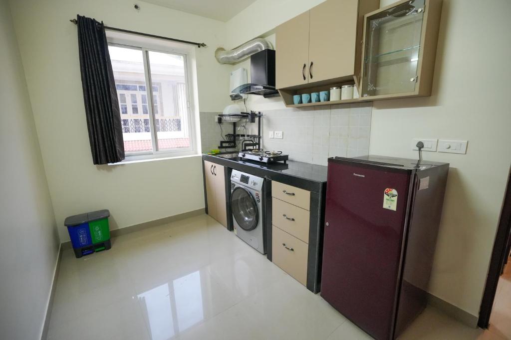Kuchyň nebo kuchyňský kout v ubytování 1 BHK Near Varca Beach