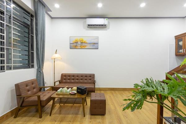 Posezení v ubytování Cỏ Hai Lá Homestay