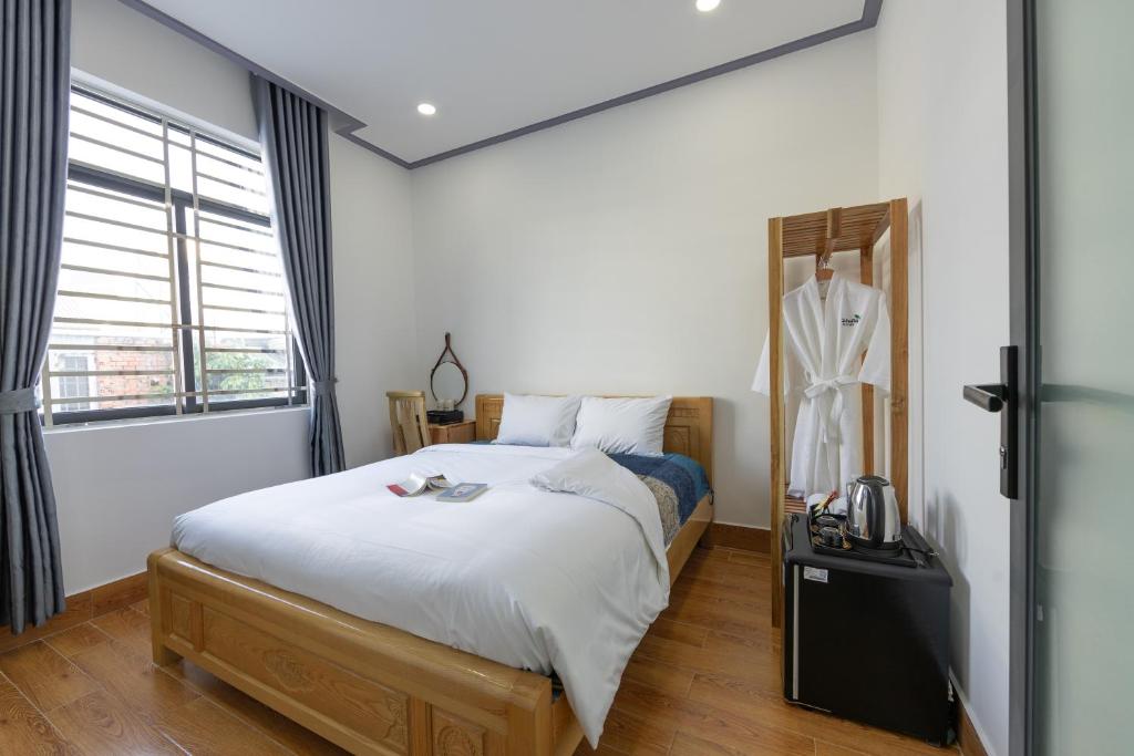 Postel nebo postele na pokoji v ubytování Cỏ Hai Lá Homestay