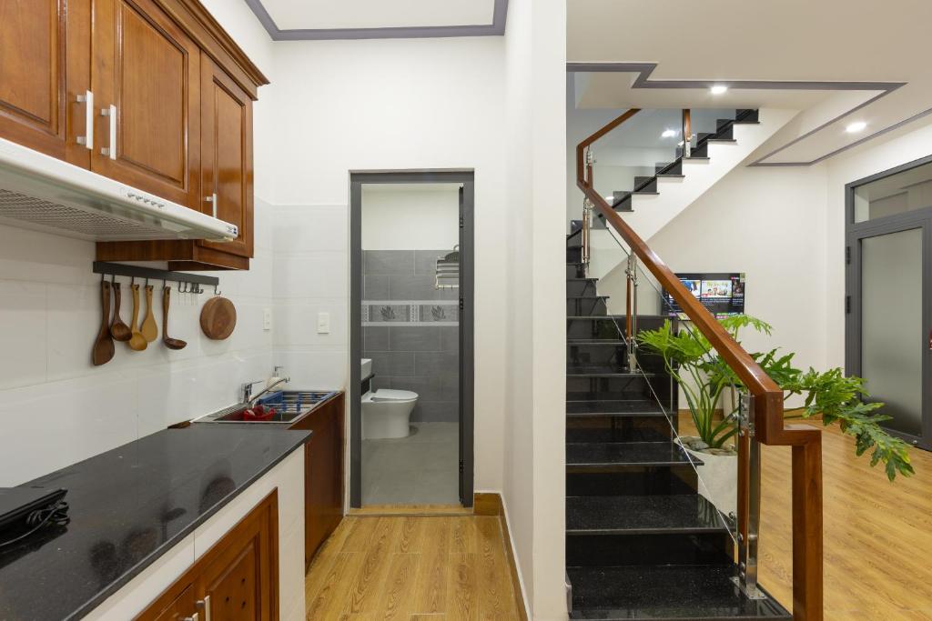 Kuchyň nebo kuchyňský kout v ubytování Cỏ Hai Lá Homestay