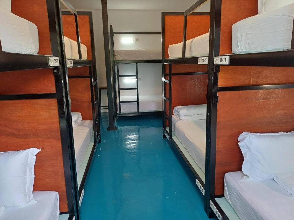 Postel nebo postele na pokoji v ubytování Green Gen Hotel, Mueang Phuket