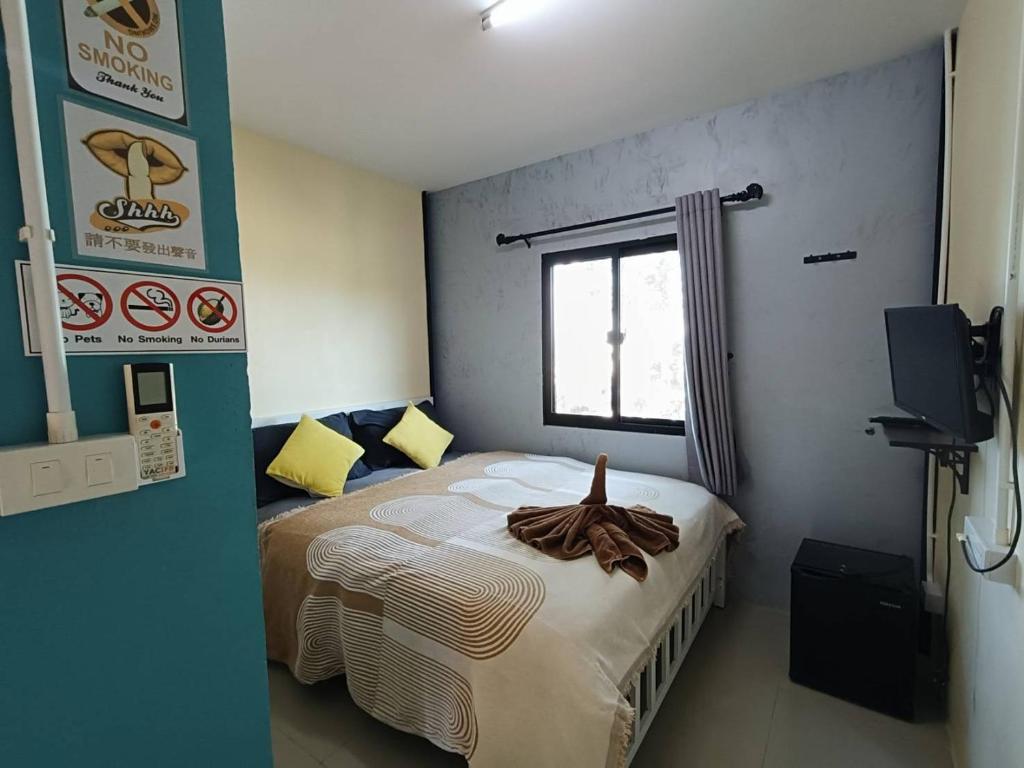 Postel nebo postele na pokoji v ubytování I-Talay Zone Sea