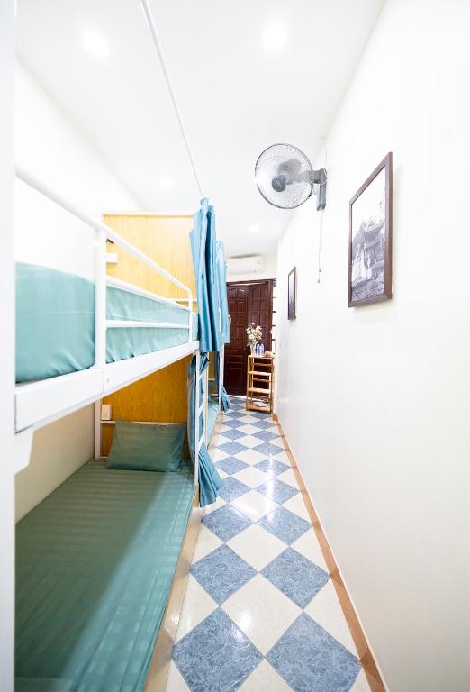 Postel nebo postele na pokoji v ubytování SKY Hostel