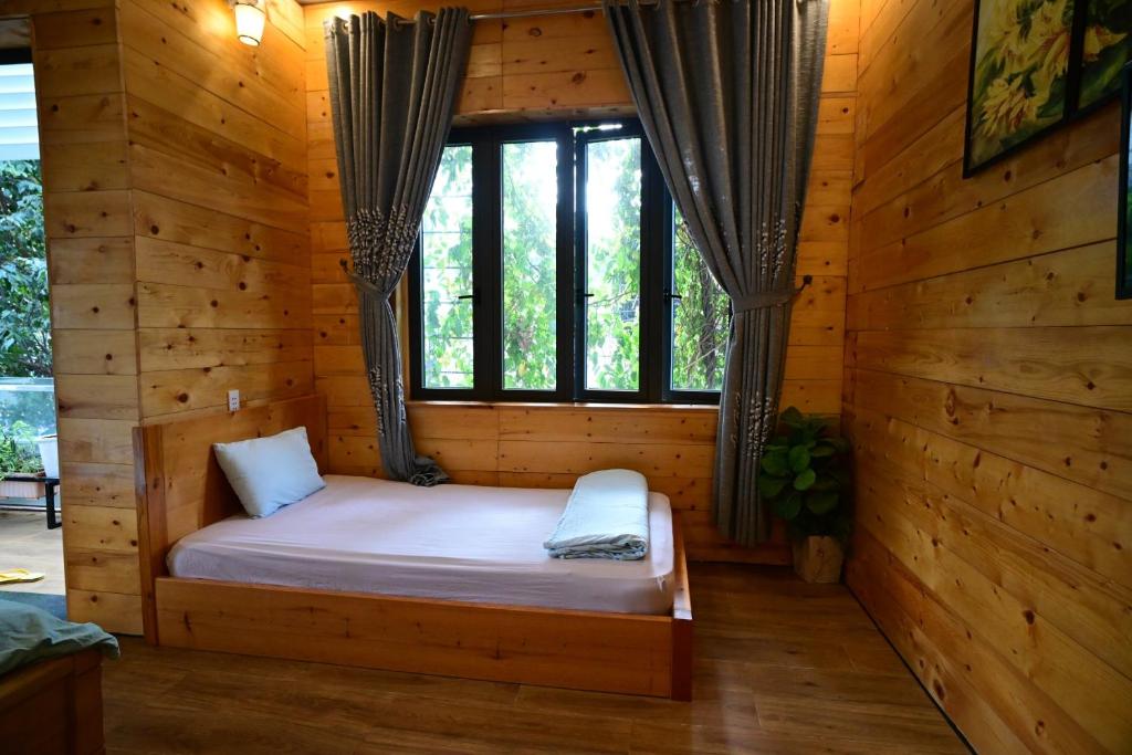 Voodi või voodid majutusasutuse Little Home Homestay toas