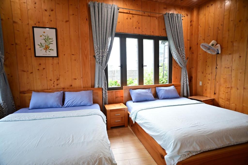 Voodi või voodid majutusasutuse Little Home Homestay toas