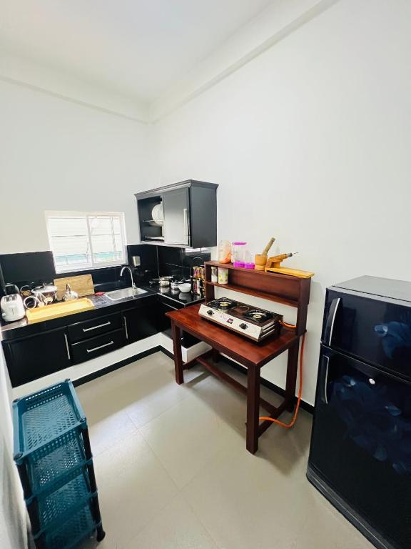 Kuchyň nebo kuchyňský kout v ubytování JO Residence - Tangalle