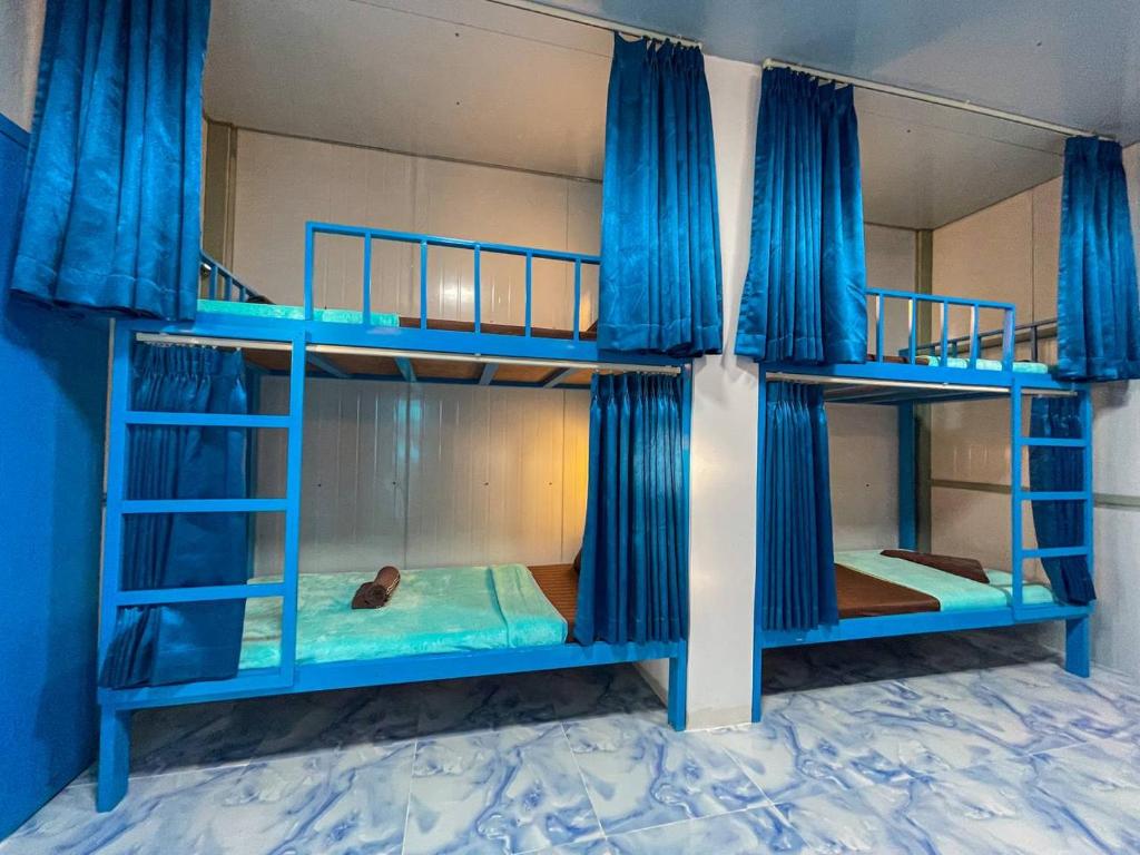 Μία ή περισσότερες κουκέτες σε δωμάτιο στο Blue Shore Pavilion