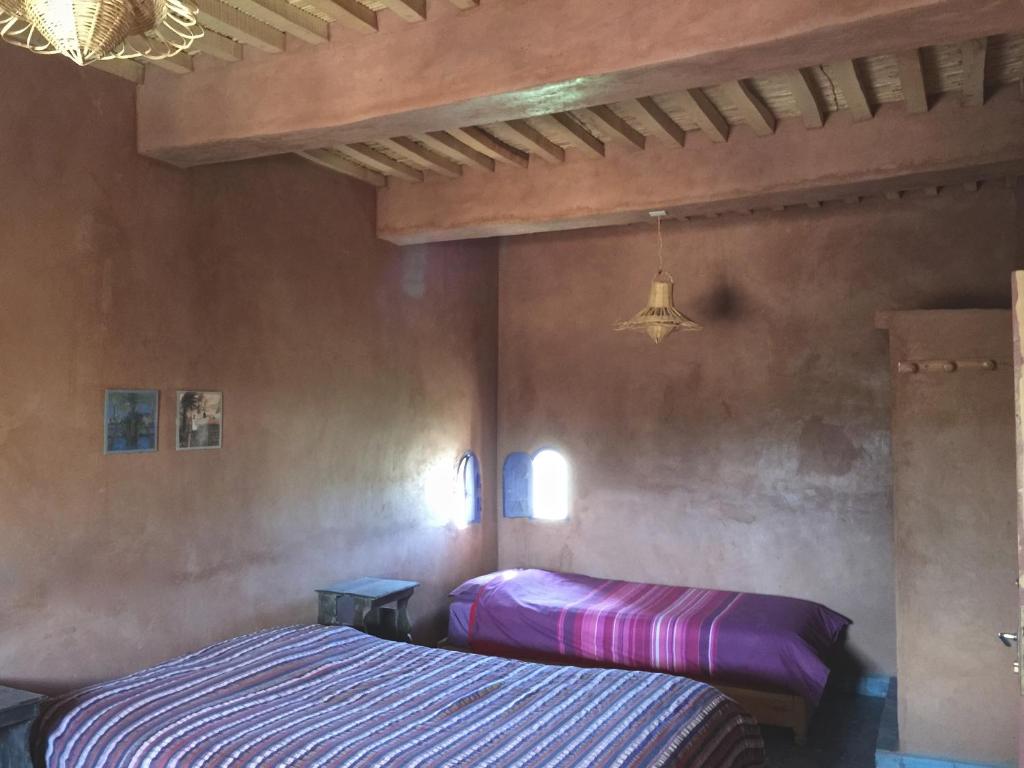 Letto o letti in una camera di Dar Sidi Bounou