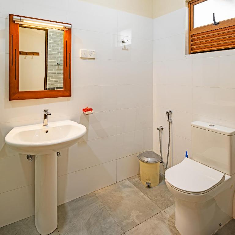 Koupelna v ubytování Hiru Hotel