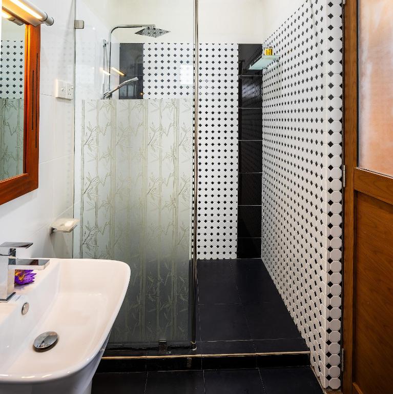 Koupelna v ubytování Hiru Hotel