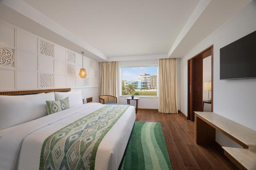 Postel nebo postele na pokoji v ubytování Fortune Beachfront, Puri - Member ITC Hotels' Group