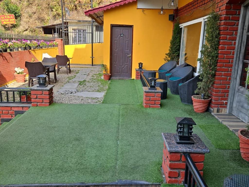 Zahrada ubytování Nirvana Mussoorie