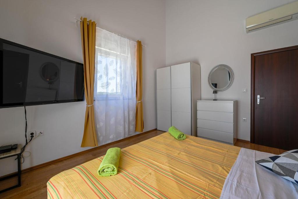 Postel nebo postele na pokoji v ubytování Villa Margherita