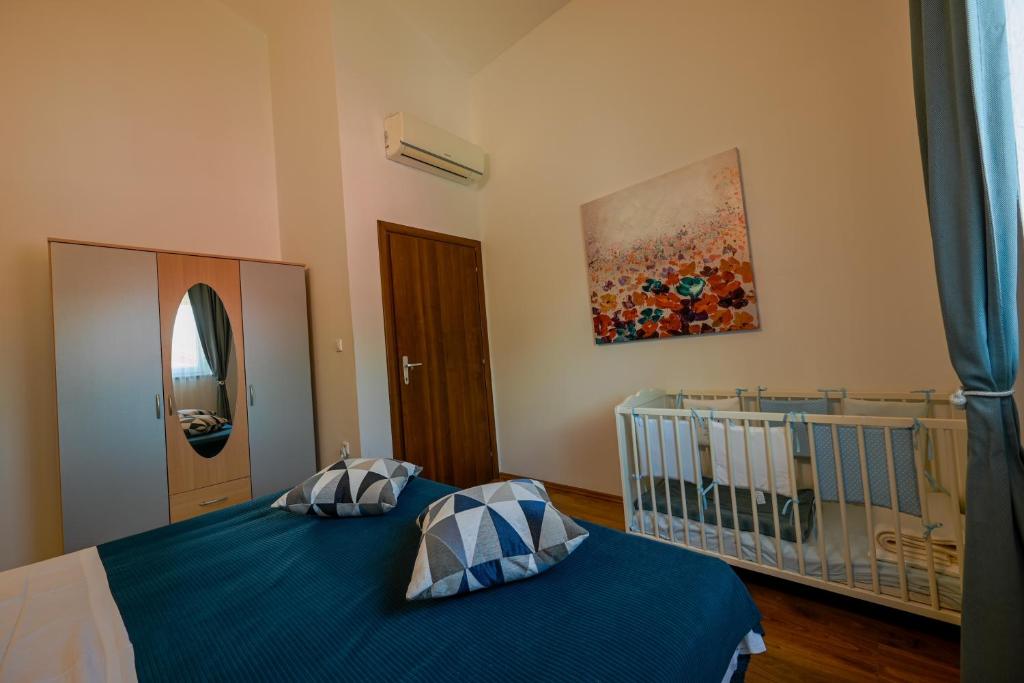 Postel nebo postele na pokoji v ubytování Villa Margherita