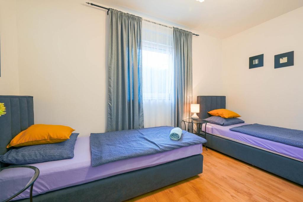 Postel nebo postele na pokoji v ubytování Villa Margherita