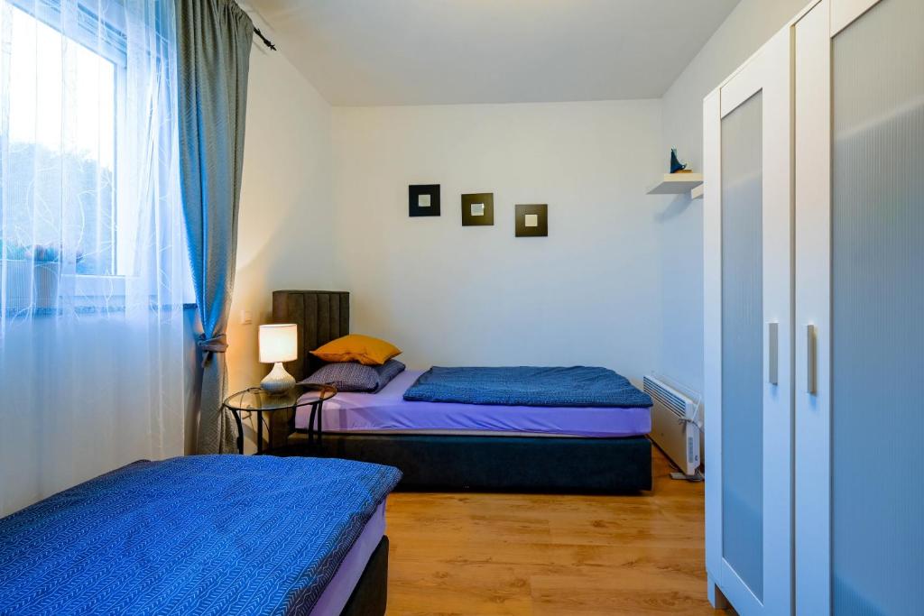 Postel nebo postele na pokoji v ubytování Villa Margherita