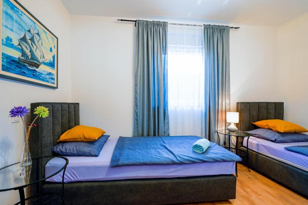 Postel nebo postele na pokoji v ubytování Villa Margherita