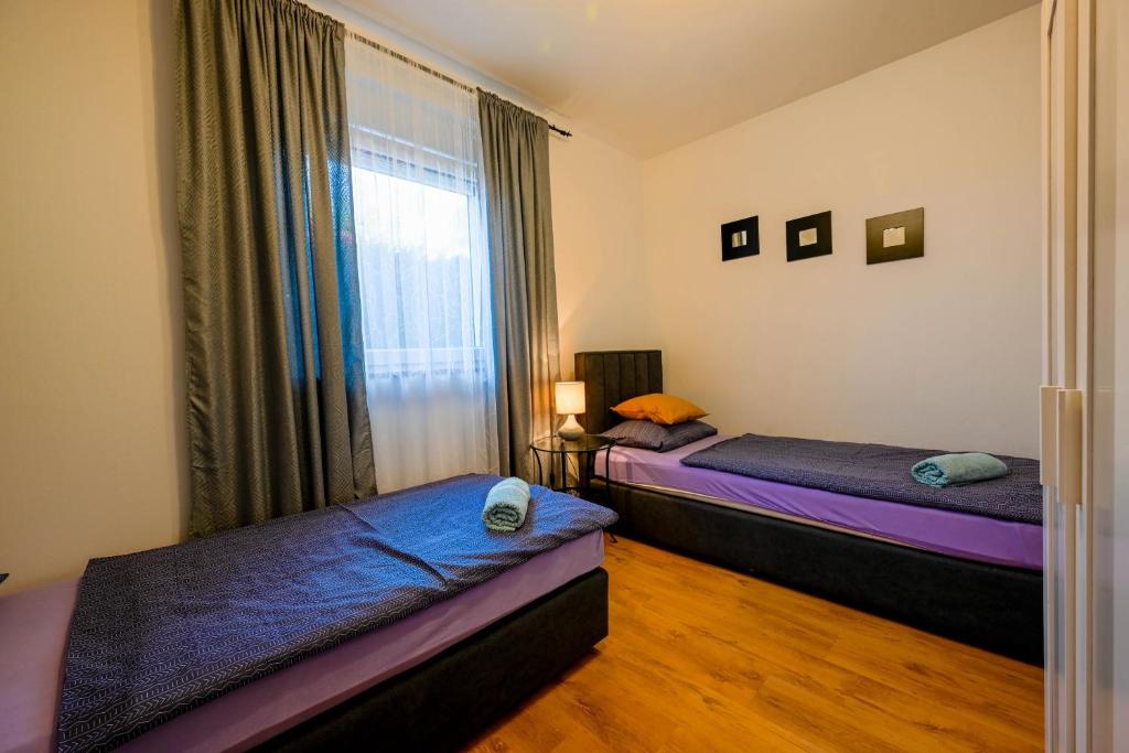 Postel nebo postele na pokoji v ubytování Villa Margherita