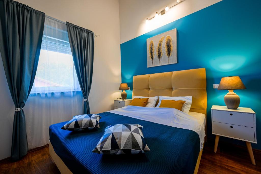 Postel nebo postele na pokoji v ubytování Villa Margherita