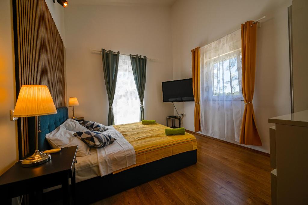 Postel nebo postele na pokoji v ubytování Villa Margherita