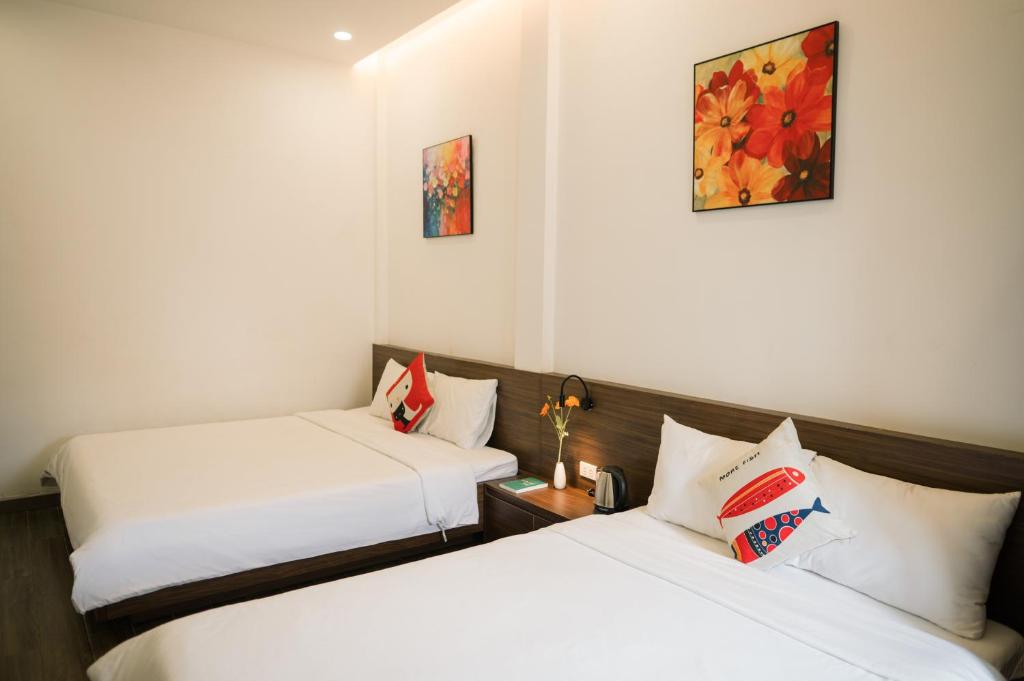 Giường trong phòng chung tại Như Ý Riverside Homestay