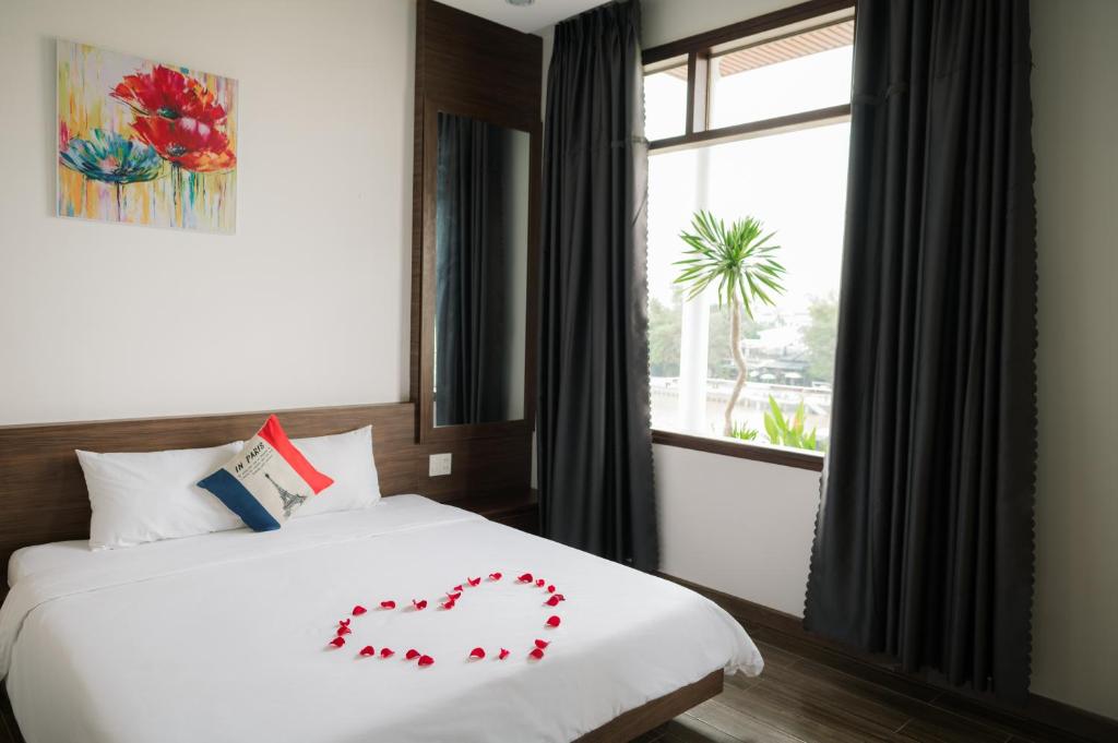 Giường trong phòng chung tại Như Ý Riverside Homestay