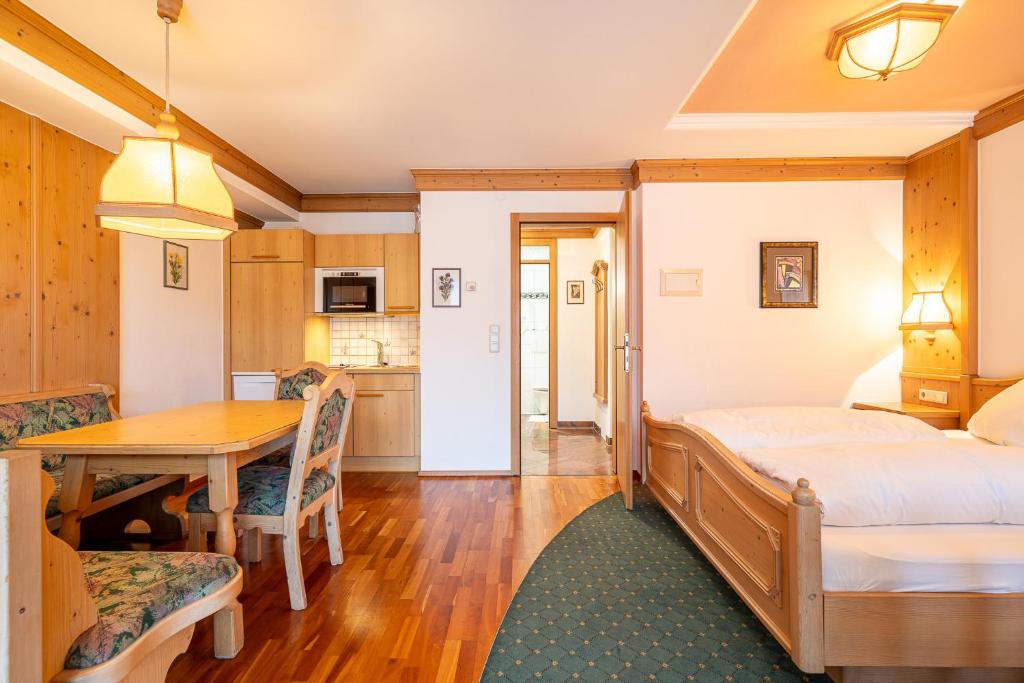 Łóżko lub łóżka w pokoju w obiekcie Dietrich Comfort Appartements