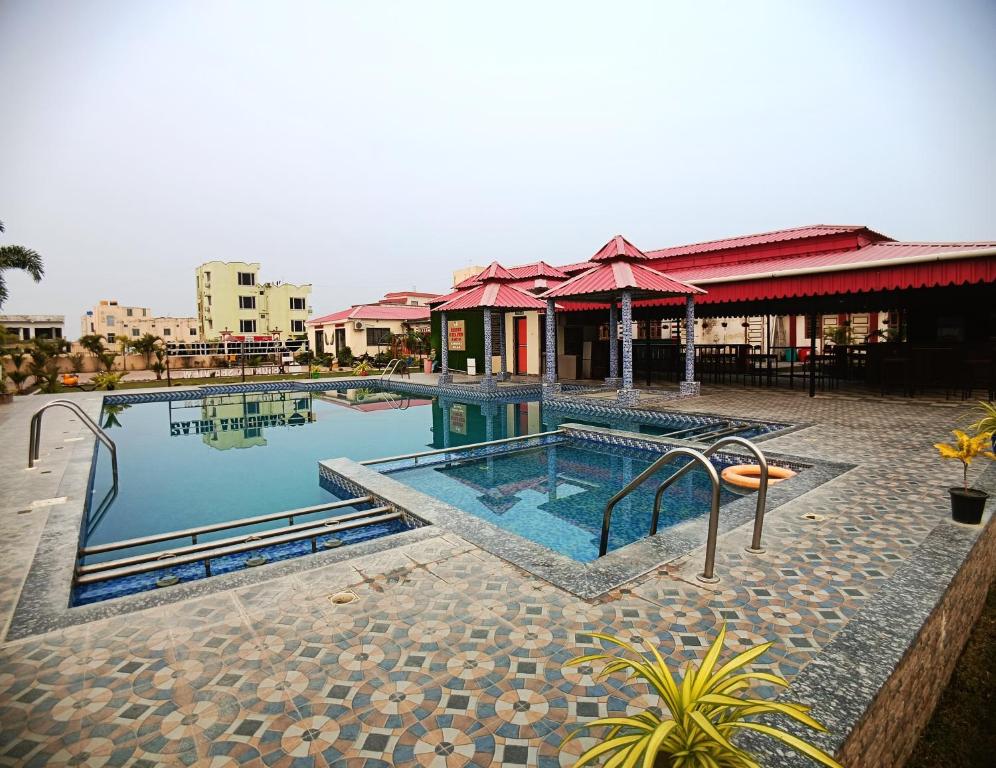 Bazén v ubytování Samudra Bilas Resort, Mandarmoni nebo v jeho okolí